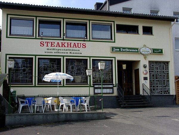 Bilder Restaurant Steakhaus Zum Dorfbrunnen Steaks vom offenen Kamin